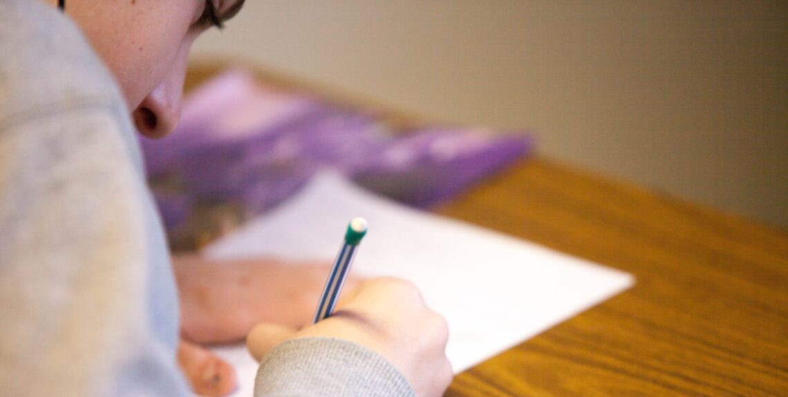 person using pencil